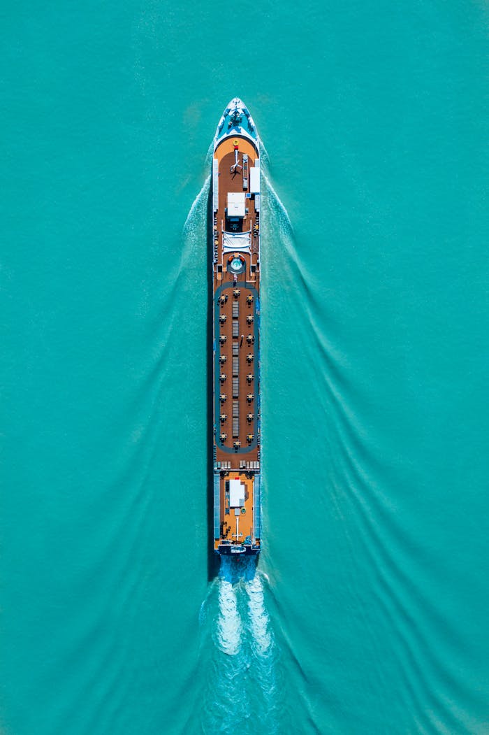 Top View Photo Of Boat On Sea